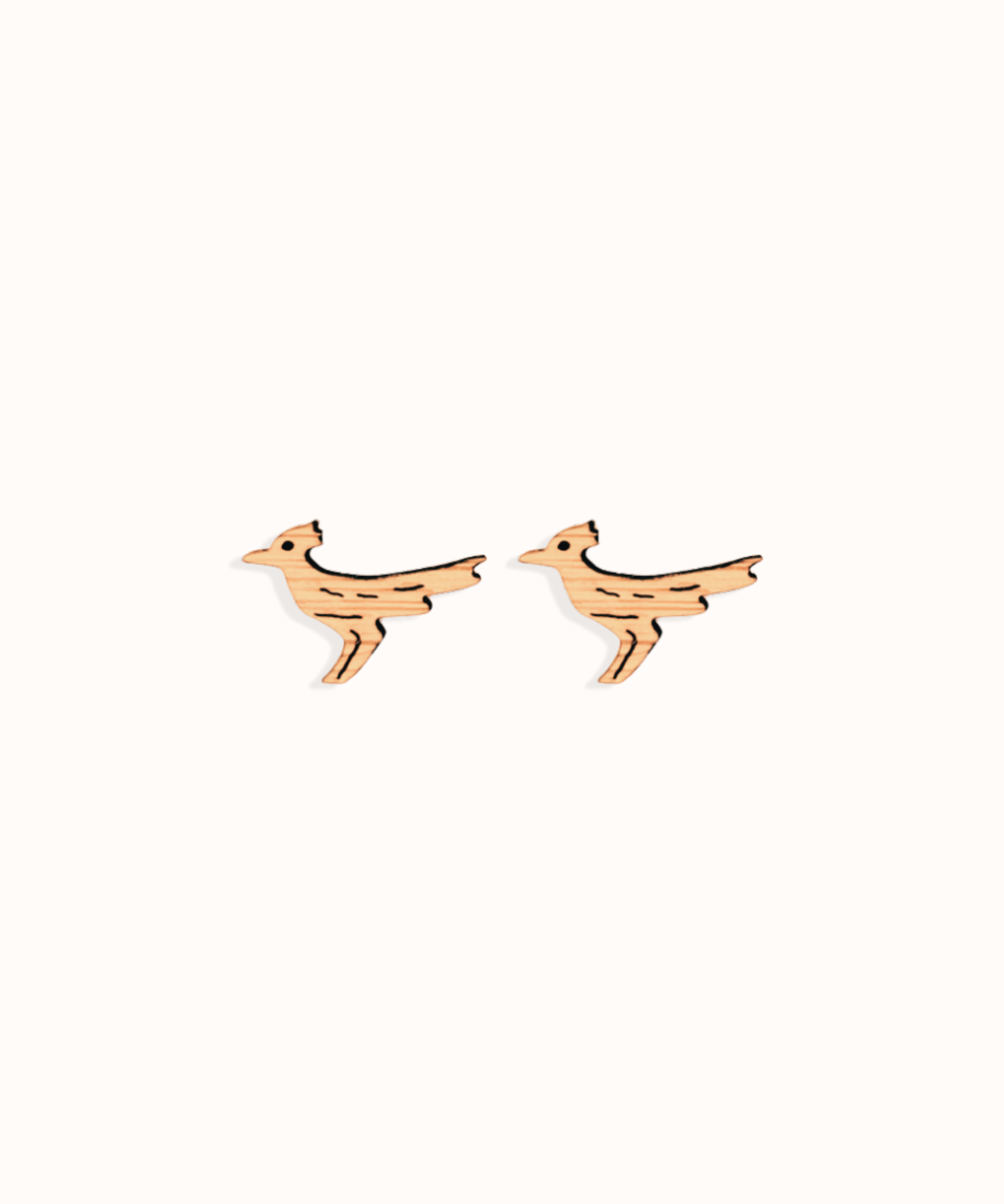roadrunner stud earring on beige background