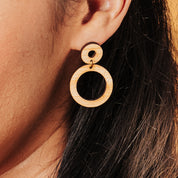 natural wood hoop dangle earrings worn by a person with dark hair. Perfect gift for minimalist